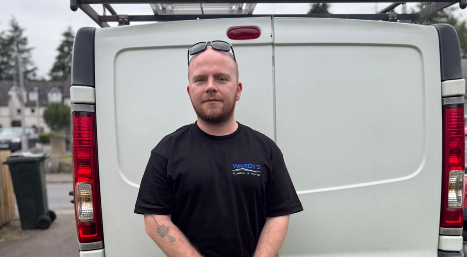 Jack Ward in front of his work van